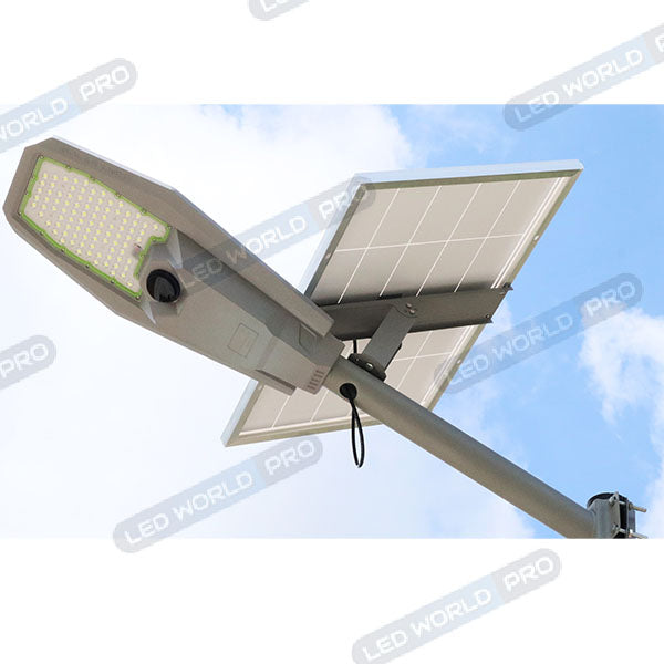 Lampe de rue solaire - Série INTERSTELLAR ULTRA - 600 Watts - 3600 Lumens - Angle 150x70° - IP65 - Lampe 62 x 30 x 8 cm - Panneau 67 x 45 cm - Controleur intelligent - Avec télecommande - Capteur PIR - 6000k - Support inclus - Capteur crépusculaire