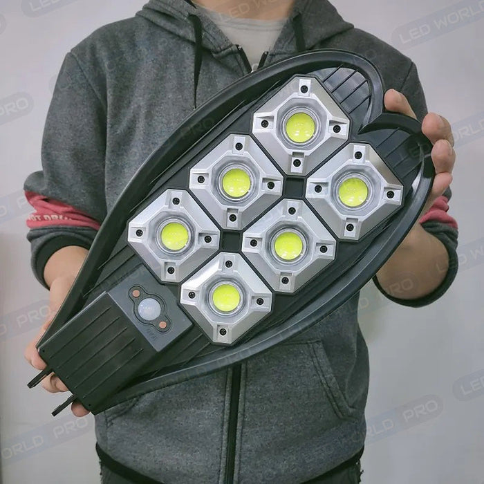 Pack 4x Lampes LED solaires pour extérieur - Série MULTI - 120 Watts - Angle 140° - IP65 - 55 x 37 x 18 cm - 3 Modes - Dimmable - COB LED - Télécommande - Détecteur de mouvement - Capteur crépusculaire - 6000k – Fonction détection 0% – 100%