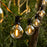Guirlande lumineuse filaire de 36 ampoules - Série GUINGUETTE - Culot E12 - 25 Watts - 75 Lumens - Angle 360° - IP44 - 22 mètres - Couleur NOIR - Avec télécommande - 2700K