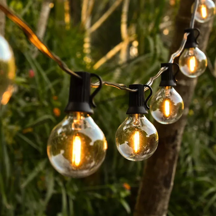 Guirlande lumineuse filaire de 36 ampoules - Série GUINGUETTE - Culot E12 - 25 Watts - 75 Lumens - Angle 360° - IP44 - 22 mètres - Couleur NOIR - Avec télécommande - 2700K