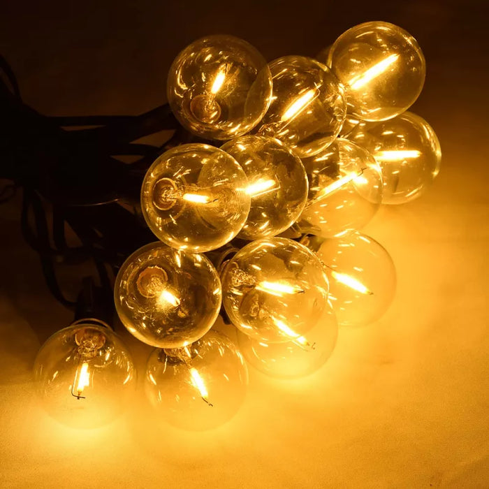 Guirlande lumineuse filaire de 36 ampoules - Série GUINGUETTE - Culot E12 - 25 Watts - 75 Lumens - Angle 360° - IP44 - 22 mètres - Couleur NOIR - Avec télécommande - 2700K