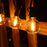 Guirlande lumineuse filaire de 36 ampoules - Série GUINGUETTE - Culot E12 - 25 Watts - 75 Lumens - Angle 360° - IP44 - 22 mètres - Couleur NOIR - Avec télécommande - 2700K