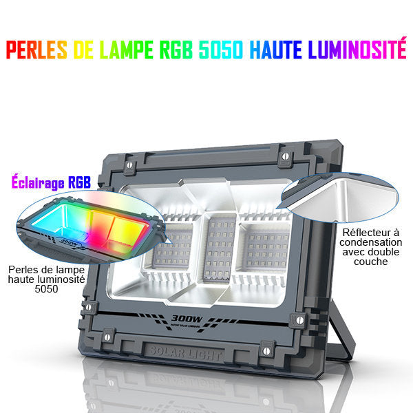 Projecteur LED solaire - Série WARRIOR RGBW (Multicolores + Blanc) - 300 Watts - Angle 120° - Lampe 34 x 27 x 8 cm - Panneau solaire 58 x 35 cm - IP67 - Avec télécommande - Avec capteur crépusculaire - Bluetooth - Rythme musical - Panneau solaire inclus