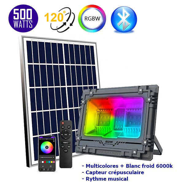 Projecteur LED solaire - Série WARRIOR RGBW (Multicolores + Blanc) - 500 Watts - Angle 120° - Lampe 38,5 x 30,3 x 8 cm - IP67 - Avec télécommande - Avec capteur crépusculaire - Bluetooth - Rythme musical - Panneau solaire inclus